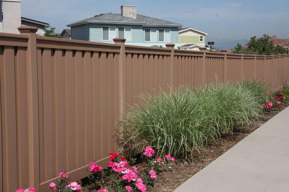 A beautiful brown fence by Trex showing one of many modern fence colors that Trex provides.